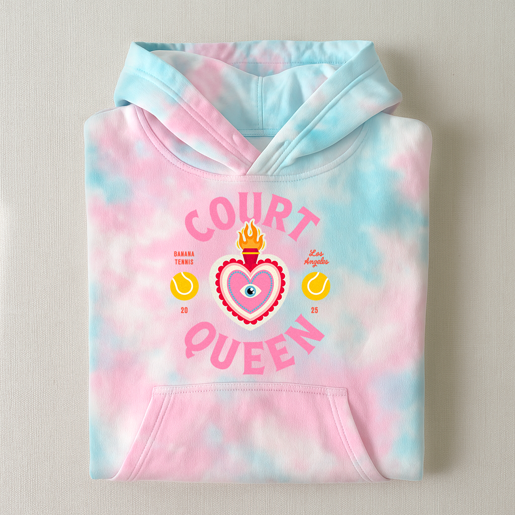 Folded tie-dye hoodie with 'Court Queen' text and graphics on a beige background