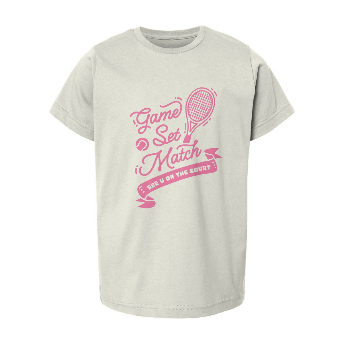Cream-colored youth t-shirt with pink 'Game Set Match' tennis graphic and ribbon banner saying 'See u on the court