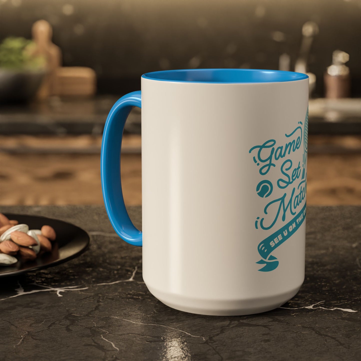 White mug with blue interior and handle, featuring text on a kitchen counter.