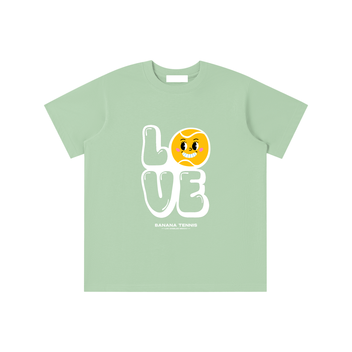 Flat-lay of pastel green youth t-shirt with bold white 'LOVE' text and cheerful tennis ball graphic as letter O