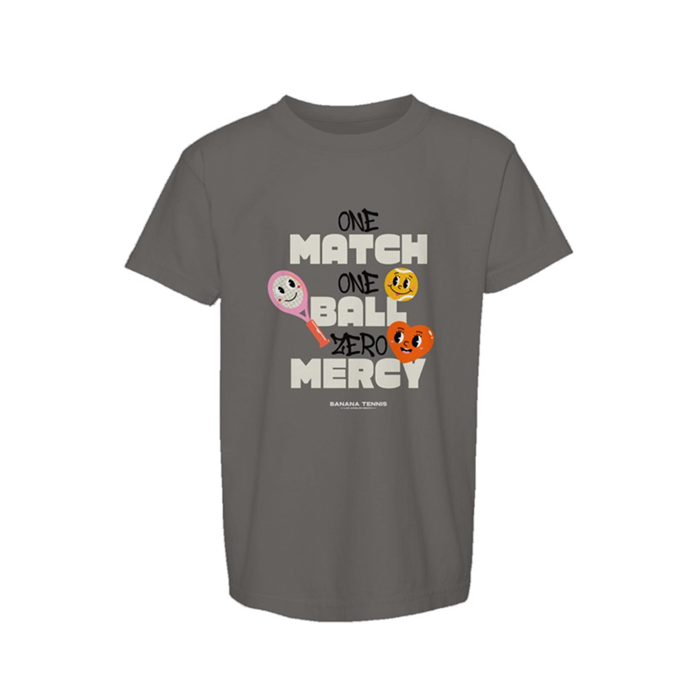 Charcoal gray youth tennis t-shirt with 'ONE MATCH ONE BALL ZERO MERCY' design in bright colors and illustrated tennis ball icons