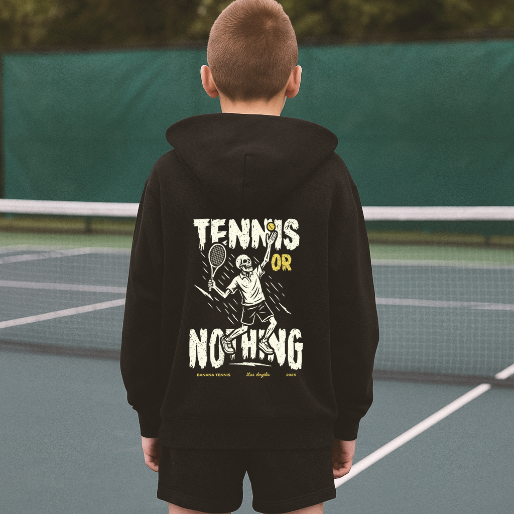 Back view of kids’ drop shoulder hoodie with Tennis or Nothing black and white graphic 
