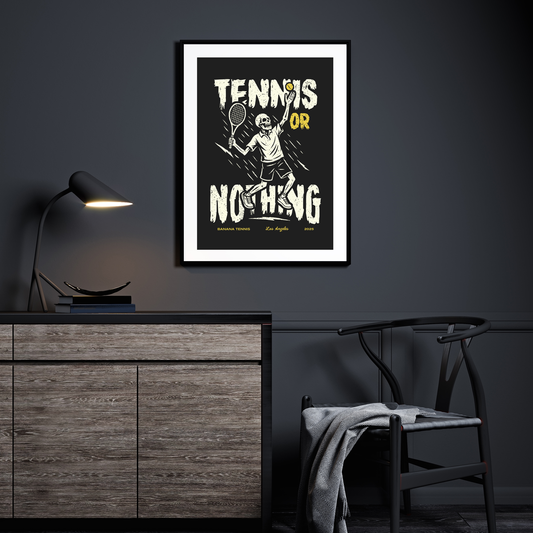 Framed poster with 'Tennis or Nothing' design on a dark wall above a wooden cabinet.